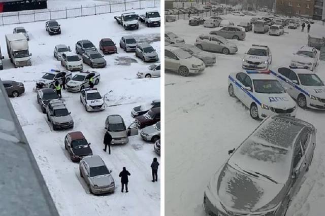 В Новосибирске четыре экипажа ДПС заблокировали двор жилого дома