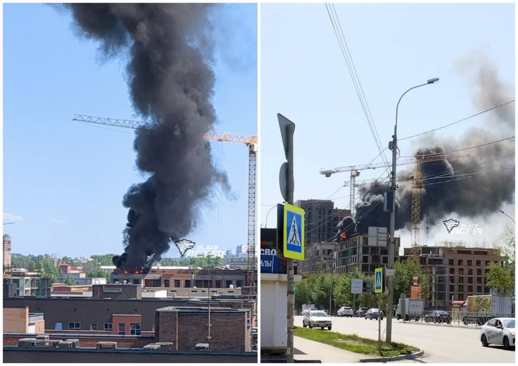 В Новосибирске на крыше строящегося дома загорелись стройматериалы