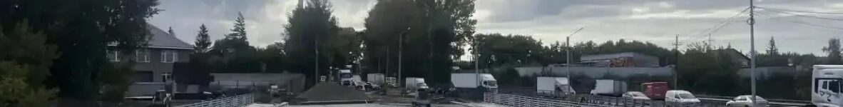Важный этап капремонта: в Новосибирске на мосту через реку Тула уложили асфальт